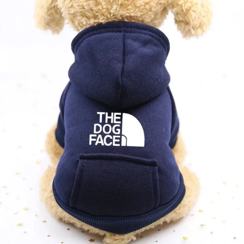FanzyMarket autumn winter cowboy pocket pet sweater for dogs and cats, windproof sports jacket with two-leg design in orange.