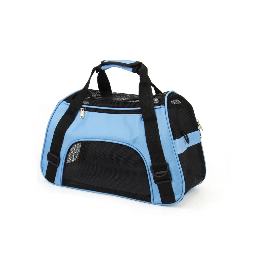 Purple FanzyMarket portable mesh pet carrier bag for small dogs and cats, breathable, foldable travel handbag, compact and lightweight.