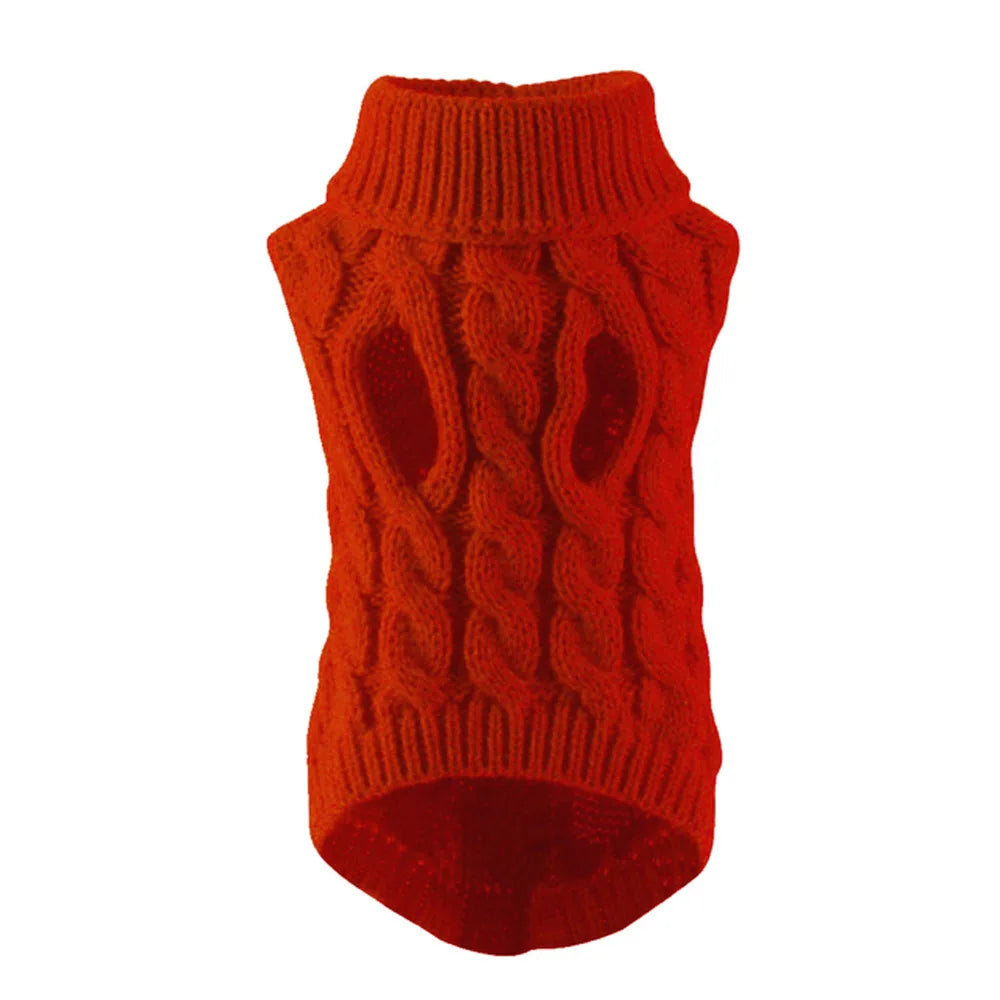 Small dog wearing a red knit cable twist sweater, warm autumn winter pet coat by FanzyMarket, cozy and stylish pet apparel.