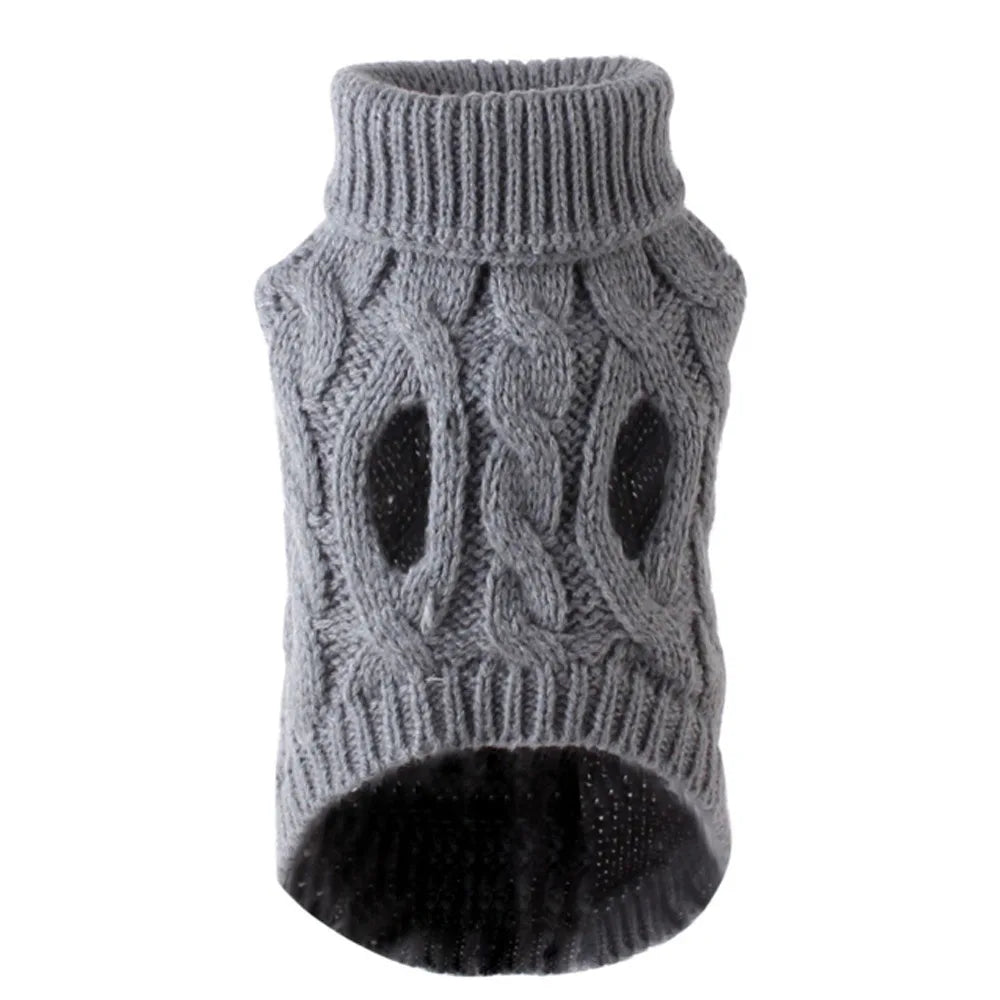 Small dog wearing a red knit sweater pullover with cable twist design, perfect for autumn and winter warmth.