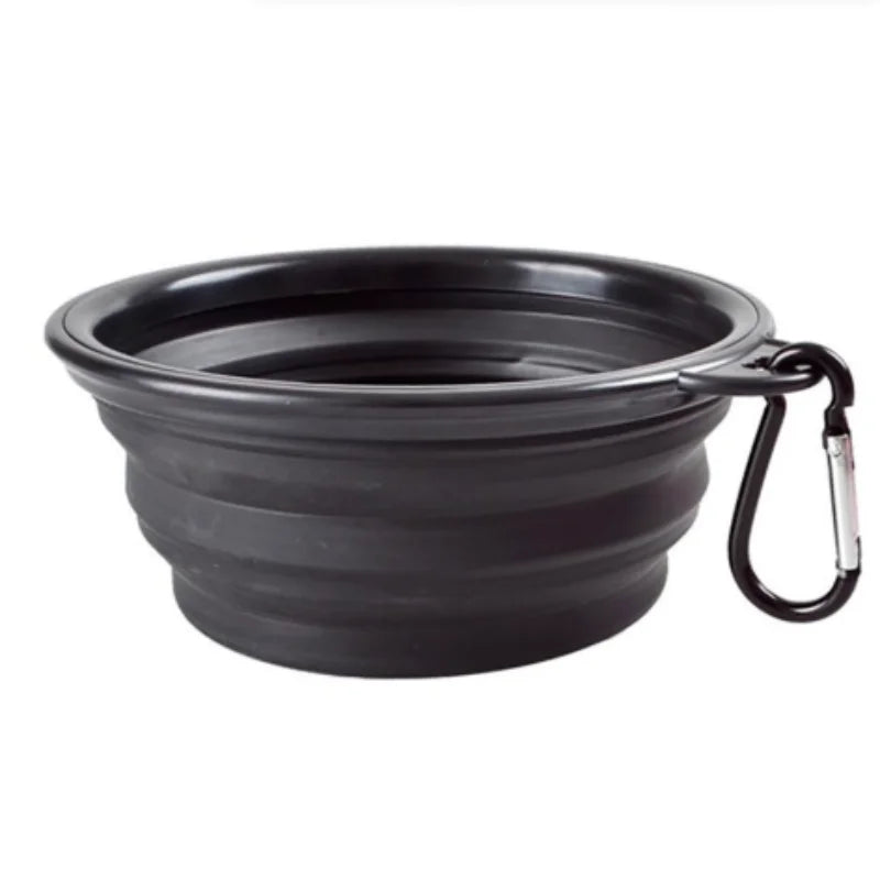 Green collapsible TPR travel pet bowl for dogs and cats, showing the portable, foldable design with 650ml capacity.