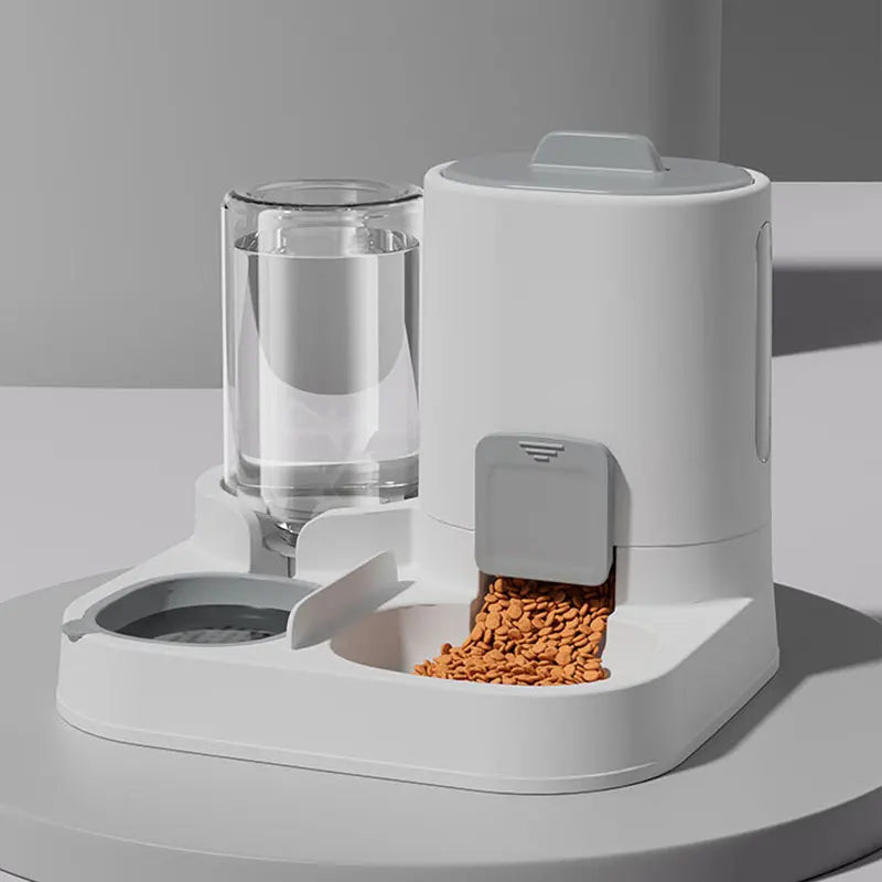 FanzyMarket automatic gravity-fed cat water dispenser and feeder in green, spill-proof, large capacity, one-piece design for pets.