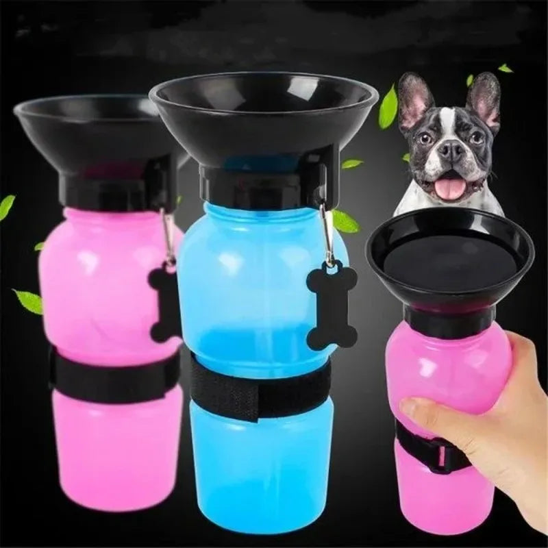 Pink 500ml portable dog and cat travel water bottle with built-in drinking bowl by FanzyMarket, ideal for pets on the go.