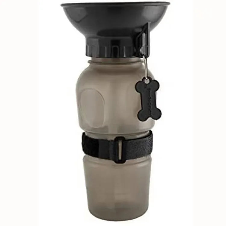 Pink 500ml portable dog and cat travel water bottle with built-in drinking bowl, ideal for pet feeding on the go.