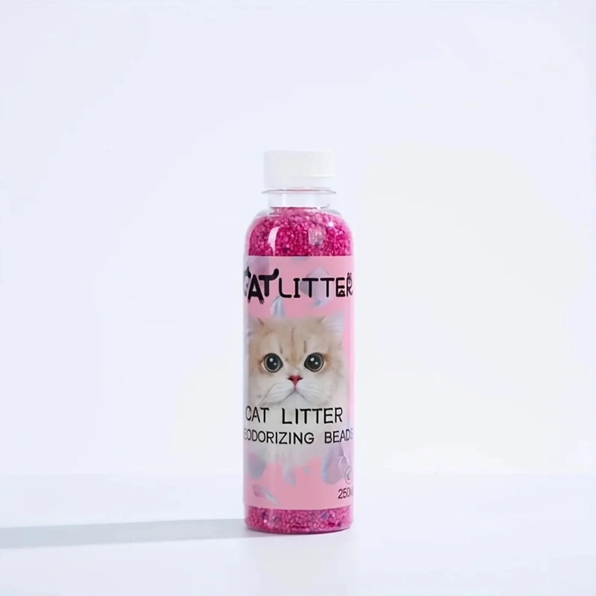FanzyMarket cat litter deodorizer beads in a green bottle, odor eliminator and litter box freshener for pet hygiene.