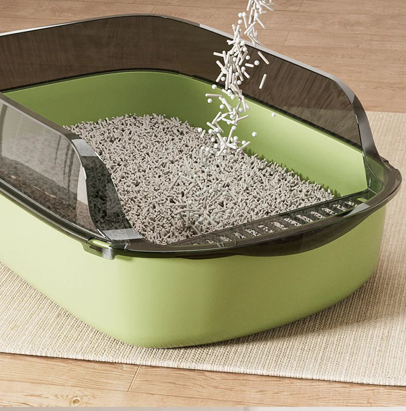FanzyMarket semi-enclosed green cat litter box with anti-splash plastic tray, large capacity in 15.7x10.2x5.9 inches.