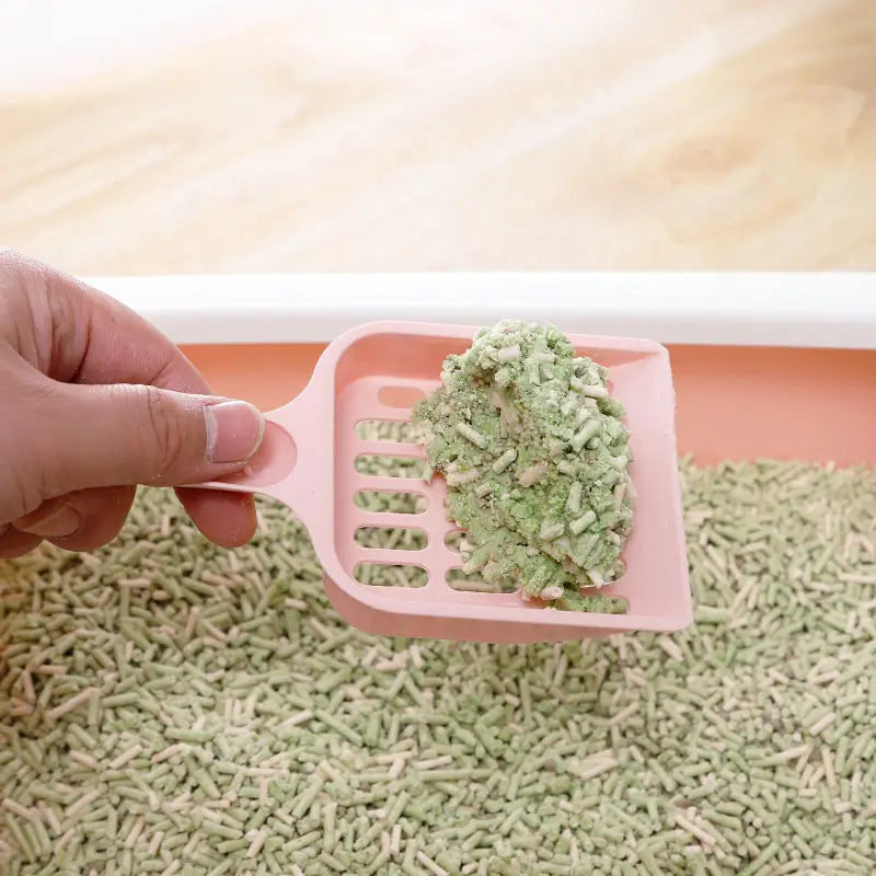 FanzyMarket cat litter scoop with hollow tofu mesh sifter, lightweight plastic, in multiple colors for pet grooming and hygiene.