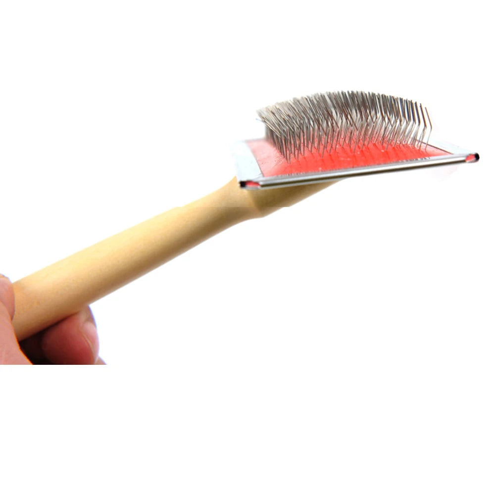FanzyMarket pet grooming needle comb with wooden handle and stainless steel teeth, detangles and removes loose hair from dogs and cats.