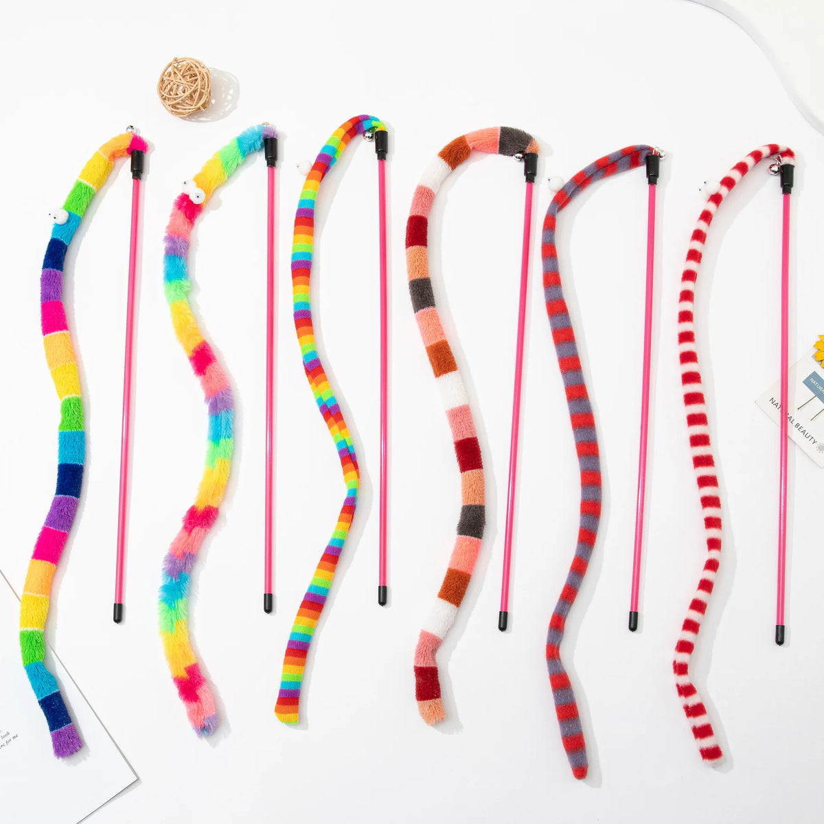 Interactive cat teaser wand with bell featuring a gradient plush caterpillar tassel toy for cats by FanzyMarket.