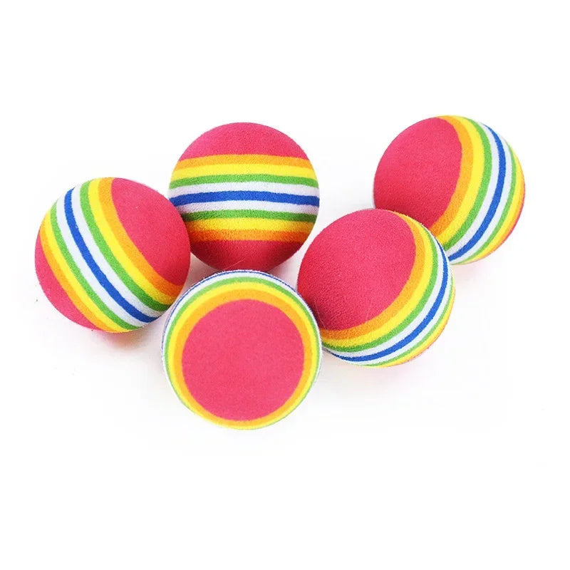 Rainbow Cat Toy Balls from FanzyMarket, set of 5 or 10 colorful rubber rattling chew toys for cats and small dogs.