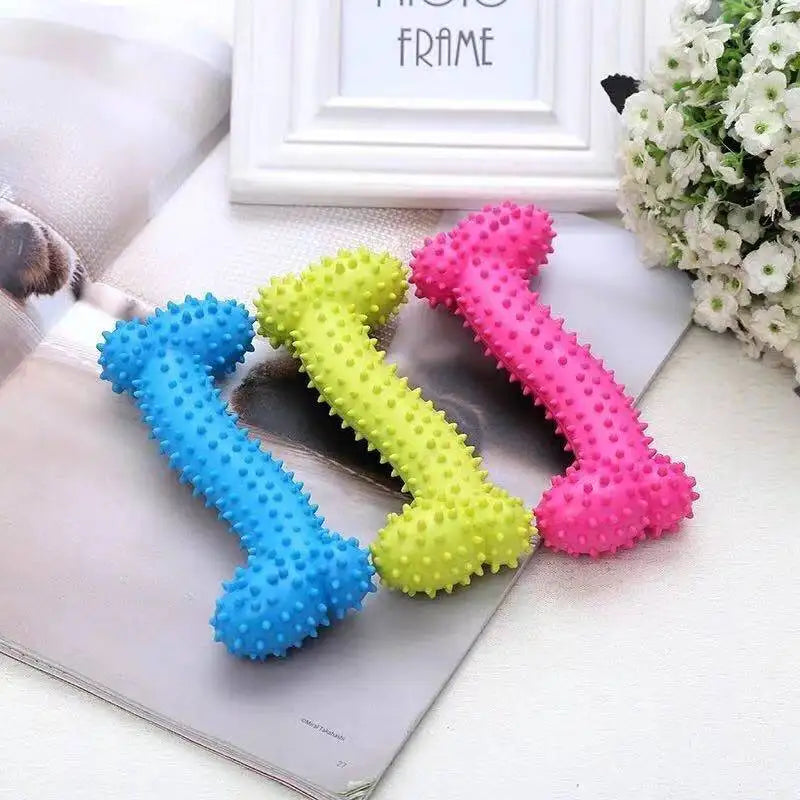 FanzyMarket bite-resistant rubber spiked dog chew toy for small dogs with squeaky feature, designed for teeth cleaning and training.