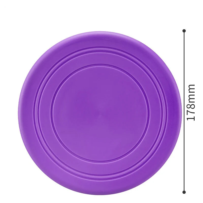FanzyMarket 7-color silicone flying saucer pet toy, chew-resistant flying disc for dogs and cats, 18cm, interactive fetch toy.