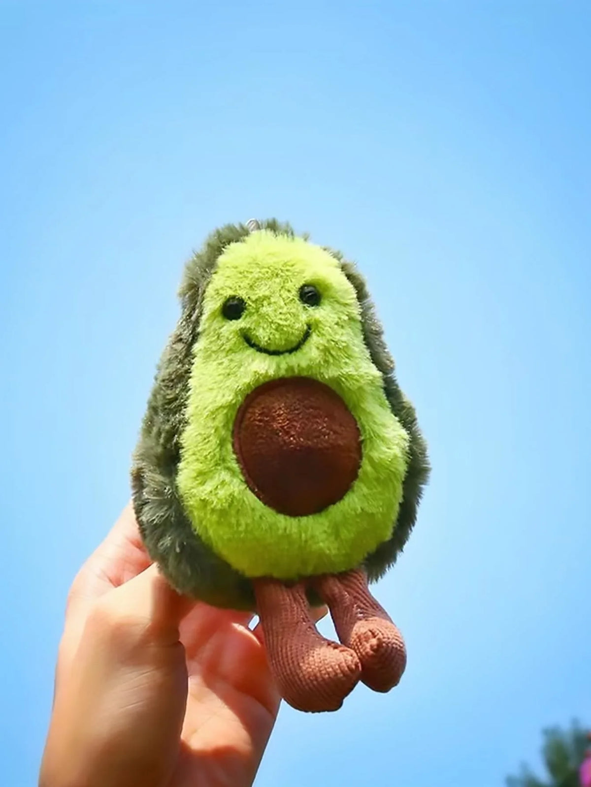 FanzyMarket avocado plush dog toy made of soft fleece, perfect for small and medium dogs to chew and cuddle.
