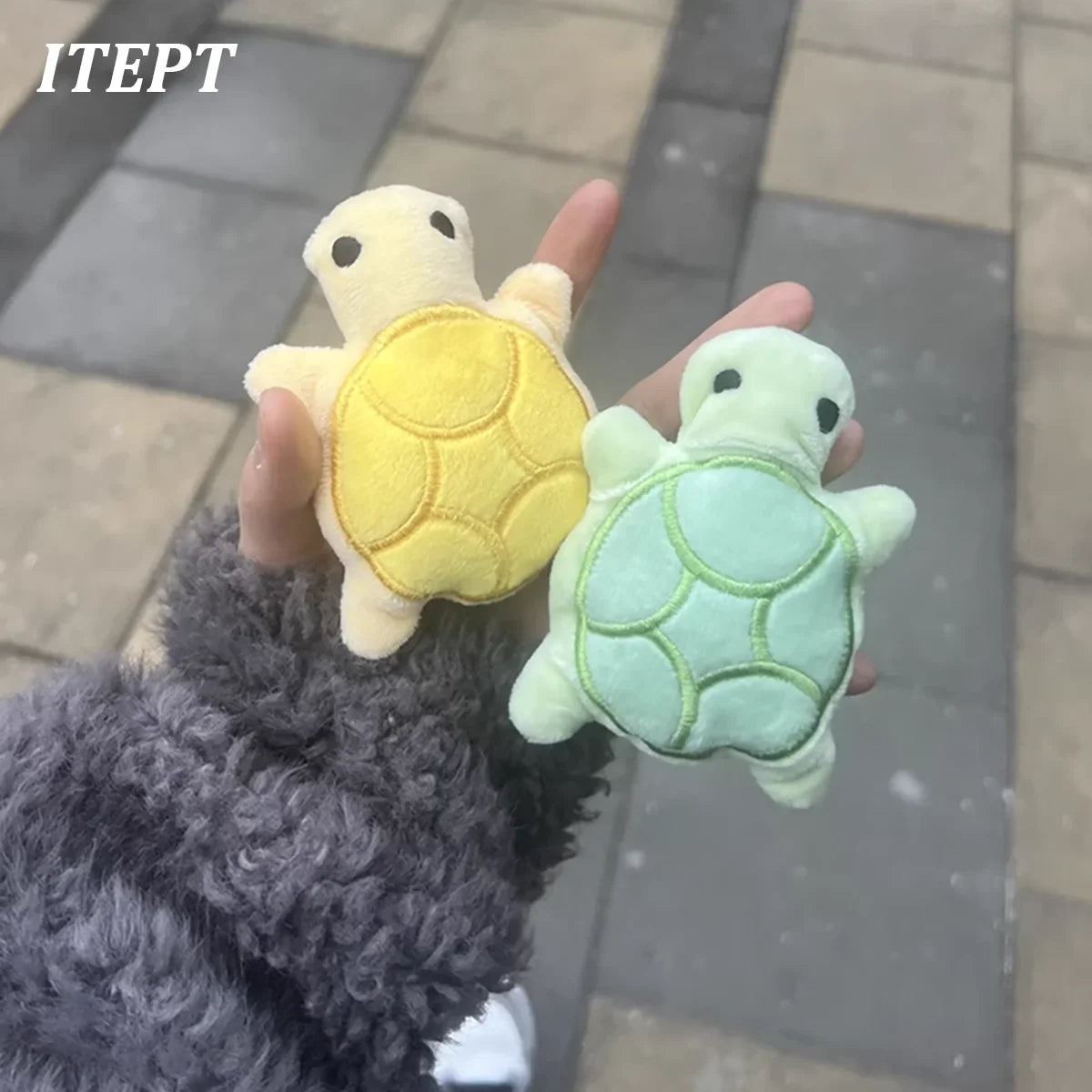 FanzyMarket mini turtle plush dog toy for puppies, perfect for teething relief and bite-resistant dental chewing.
