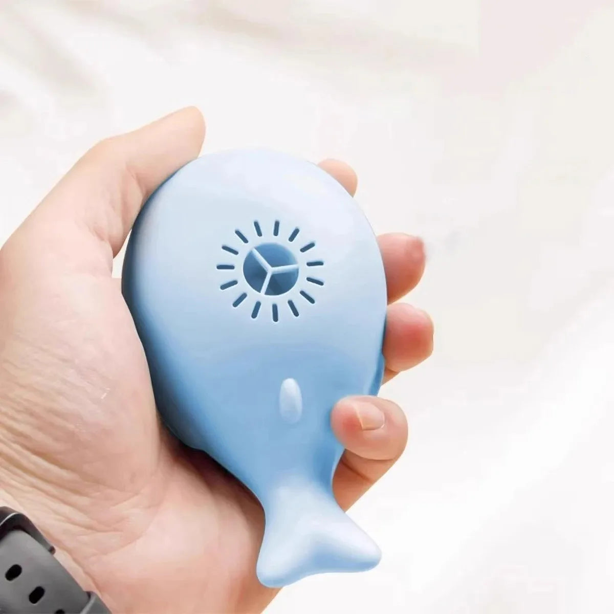 Pink whale-shaped electric floating cat toy with USB rechargeable fan, portable, dual-function, and 3C certified for pet entertainment.