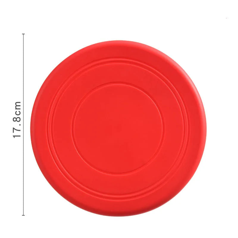 FanzyMarket 7-inch silicone flying disc toy for dogs and cats, chew-resistant and interactive for fetch and puppy training.