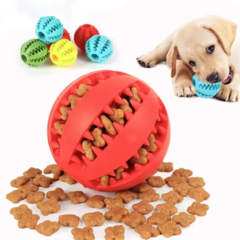 Red interactive rubber dog and cat toy ball with treat feeder, chew features, and silicone surface for cleaning teeth.