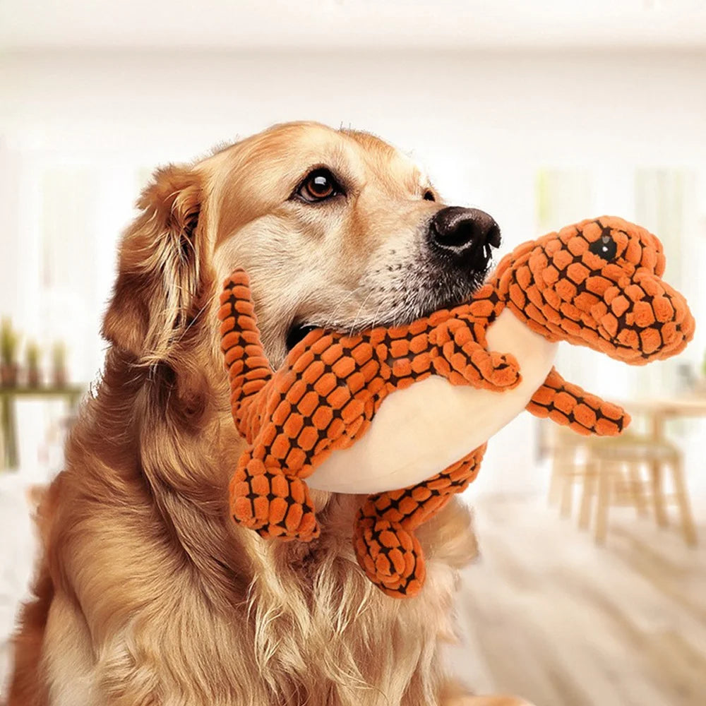 FanzyMarket plush dinosaur chew toy for dogs and cats, interactive fleece material, small size, soft and durable pet toy.
