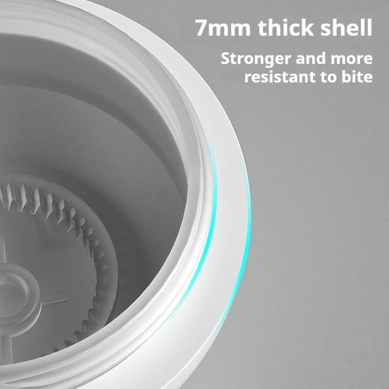 FanzyMarket rechargeable pet toy ball with RGB LED lights, bouncing and rolling for dogs and cats, in grey.