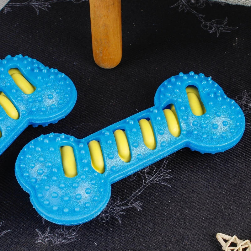 Yellow squeaky dog chew toy by FanzyMarket, bite-resistant puppy toothbrush for teeth cleaning and massage, 7.5 x 3.5 inches.