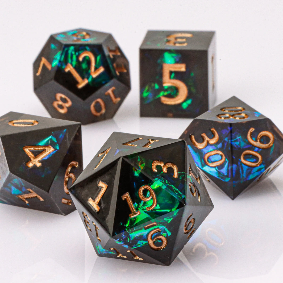 Handmade resin 7-piece D20 polyhedral dice set for Dungeons & Dragons and tabletop RPGs, featuring colorful, detailed dice in a set.