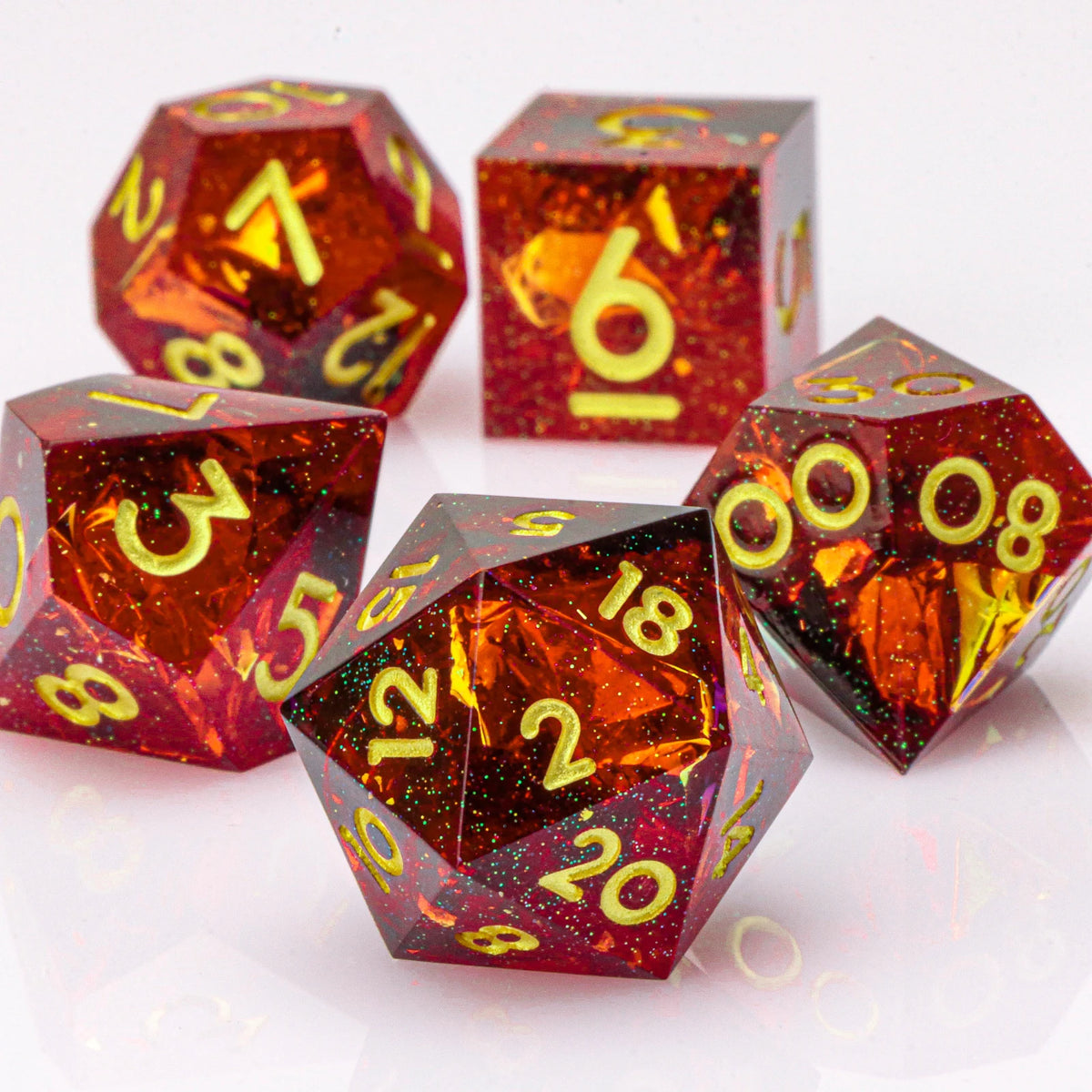 Handmade resin 7-piece D20 polyhedral dice set for Dungeons & Dragons and tabletop RPGs, featuring colorful, detailed dice.