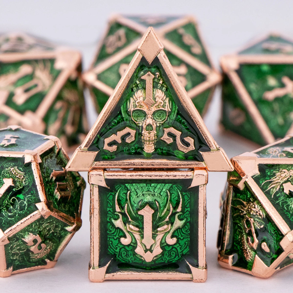 FanzyMarket skull and dragon metal dice set with seven polyhedral DnD dice for tabletop RPG gaming, featuring detailed skull and dragon designs.
