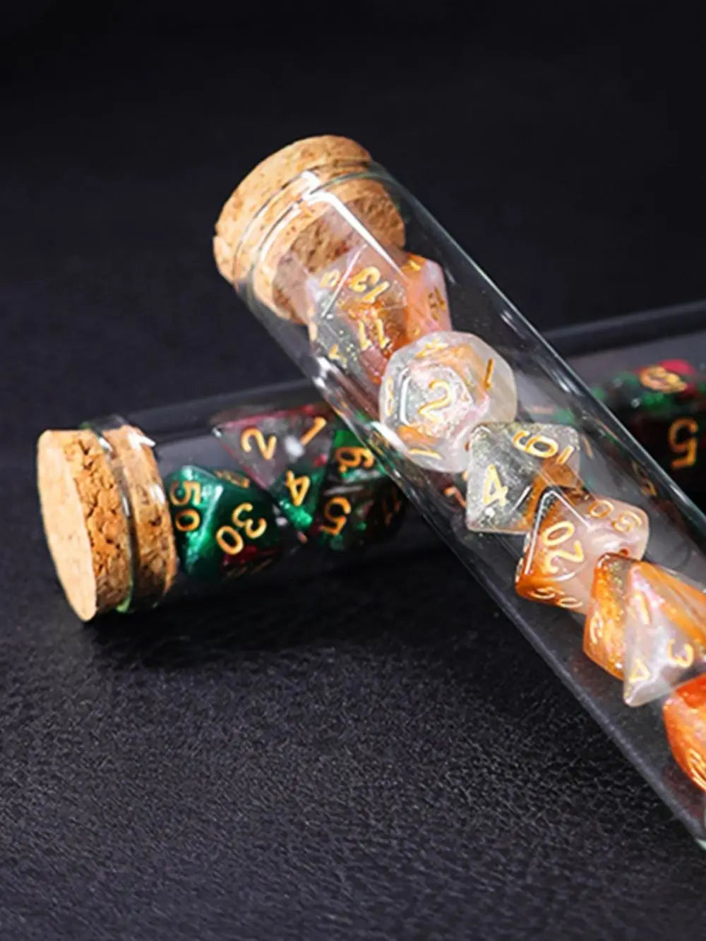 Transparent purple and dark blue 7-piece polyhedral RPG dice set from FanzyMarket, styled like potion flasks for tabletop gaming.