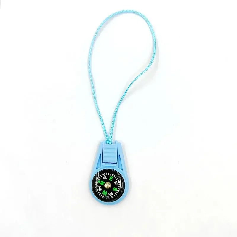 Blue mini tactical pocket compass keychain from FanzyMarket, used for camping, hiking, and outdoor survival.