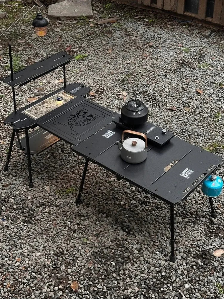 FanzyMarket aluminum folding camping table, portable and expandable tactical table for outdoor camping and fishing adventures.