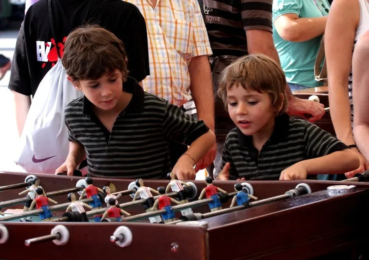 FanzyMarket professional foosball table for adults, 2-player table soccer game with sturdy design and detailed playing surface.