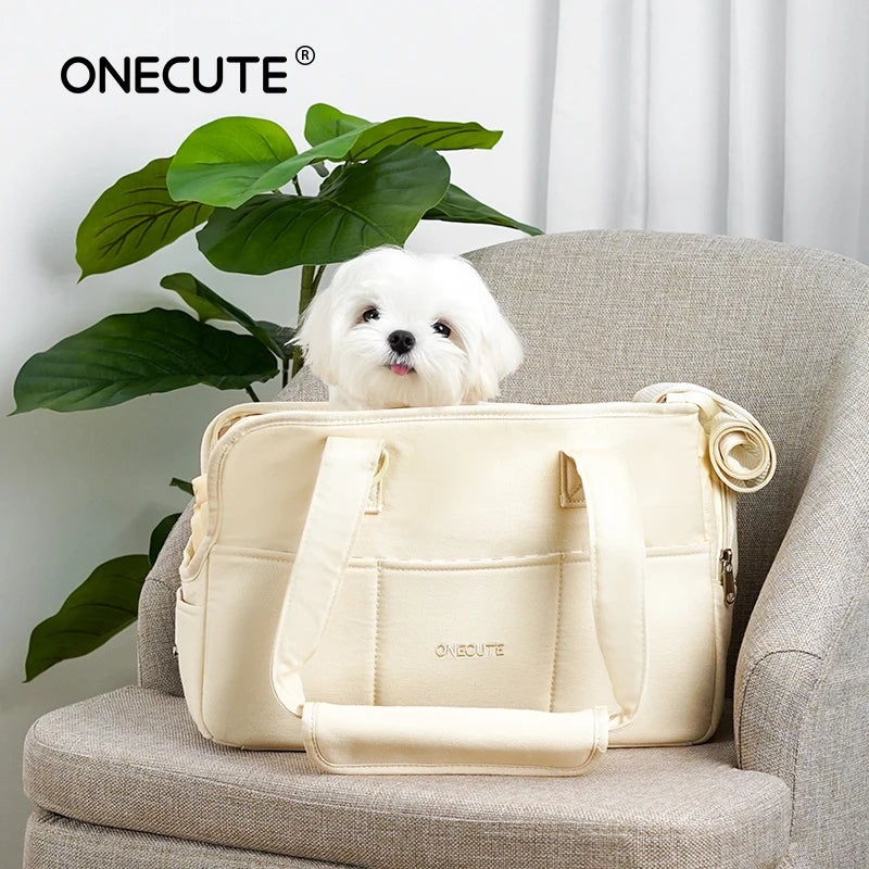 Beige FanzyMarket cotton pet sling carrier for small dogs and cats, featuring shoulder strap and pillow for comfort.